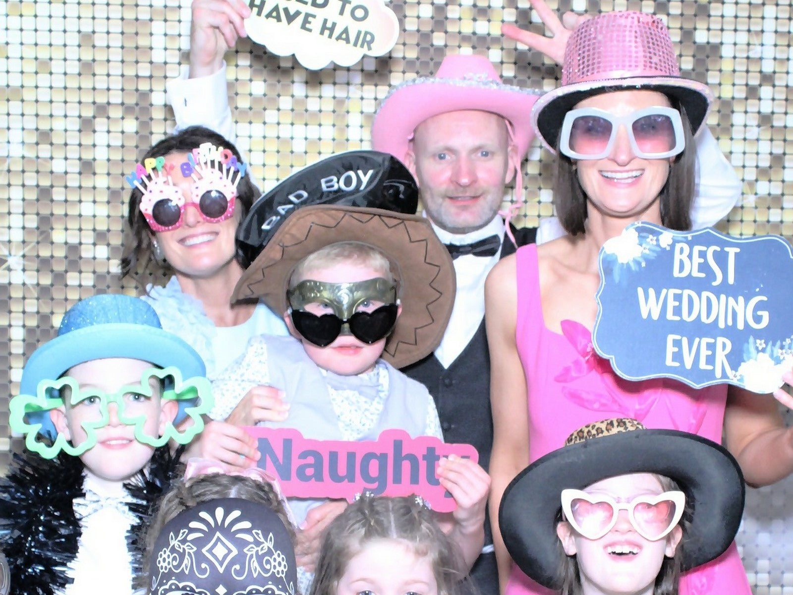 Wedding guests having fun posing for photos with Lumina